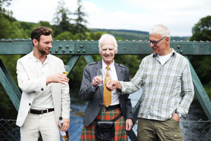 Thomson Family Whisky drinking on a bridge